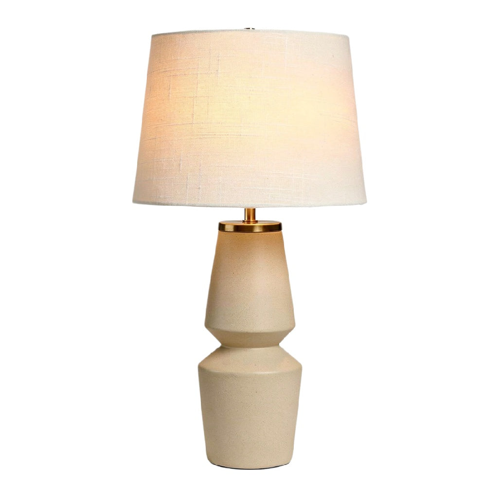 **Lampa stołowa z ceramiczną podstawą i materiałowym kloszem**